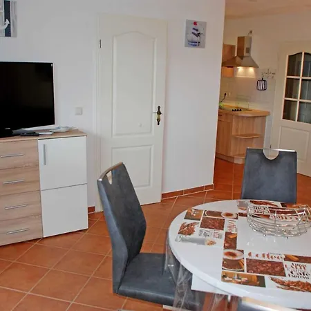 Апартаменты Ferienwohnung Strandlaufer *